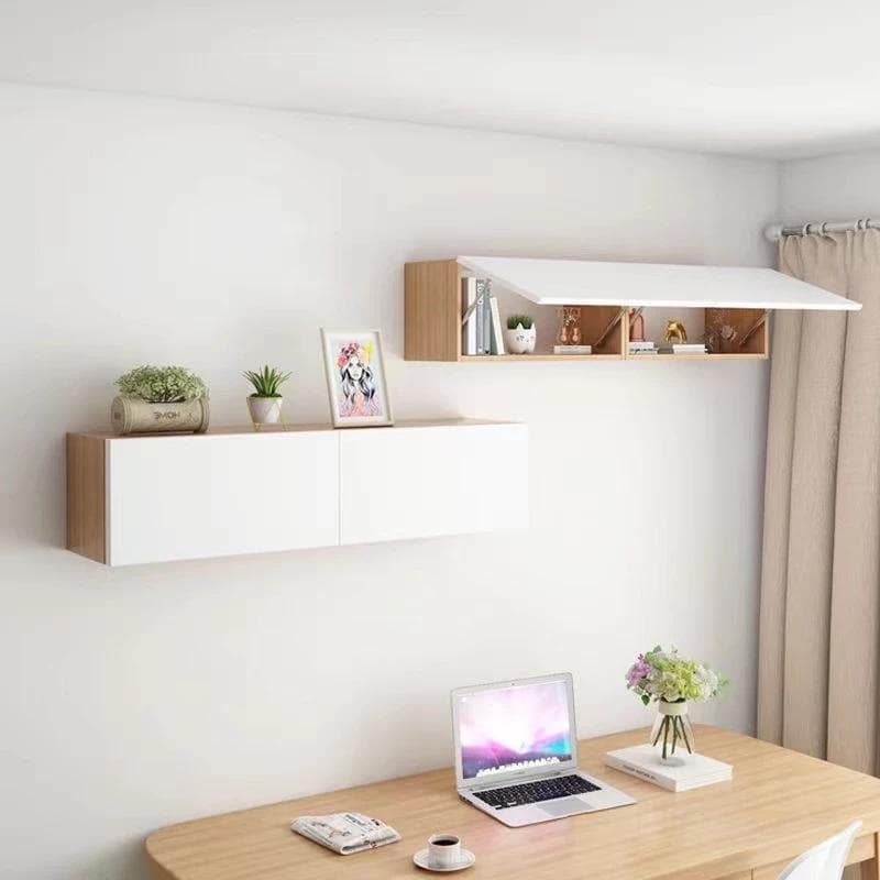 Modern minimalist home office setup with wooden desk, laptop, fresh flowers, and wall-mounted shelves for books, plants, and decorative items.
